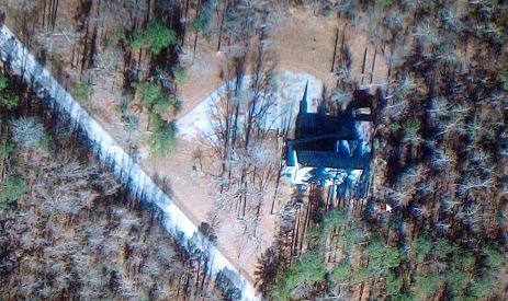 Unfortunately, Street View hasn't made it to the heart of the forest, but this is a current view from space of the Church in the Forest as it still stands today.